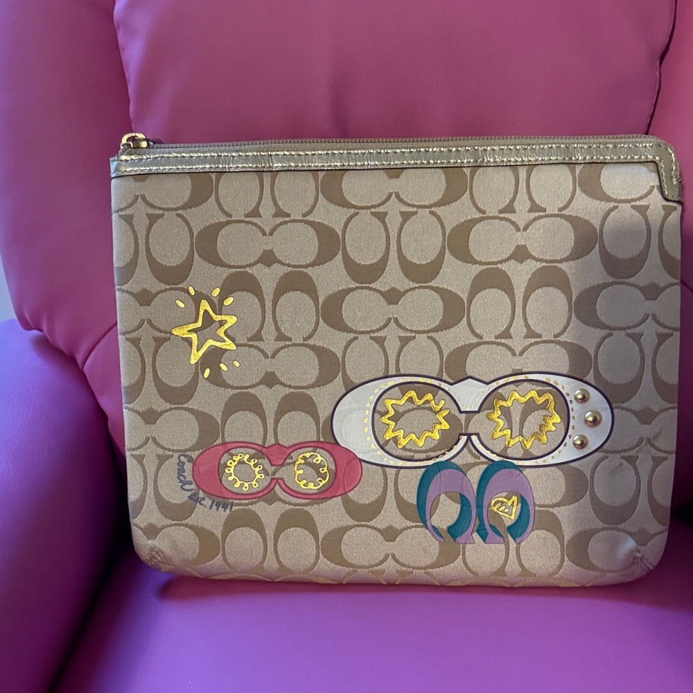 Coach Tan Wristlet with Fun Graphic Accents